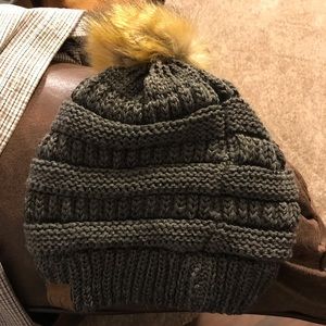 Hat with puff ball